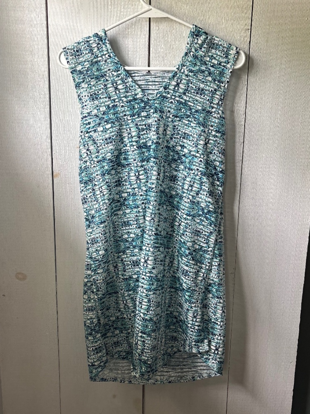 Woman’s hooded swimsuit cover up